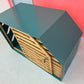 Unique Emerald Dog House - Stylish Shelter for Your Furry Companion